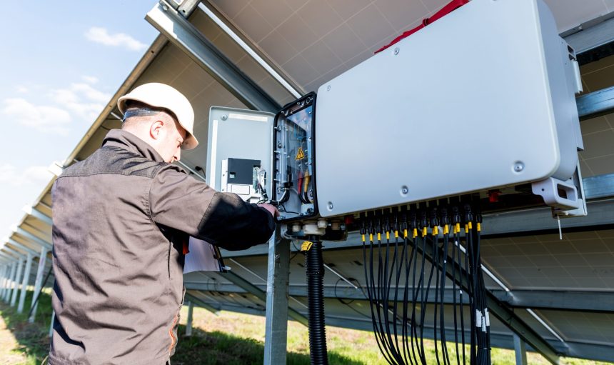 The inspector checks the actual output voltage level of inverter.